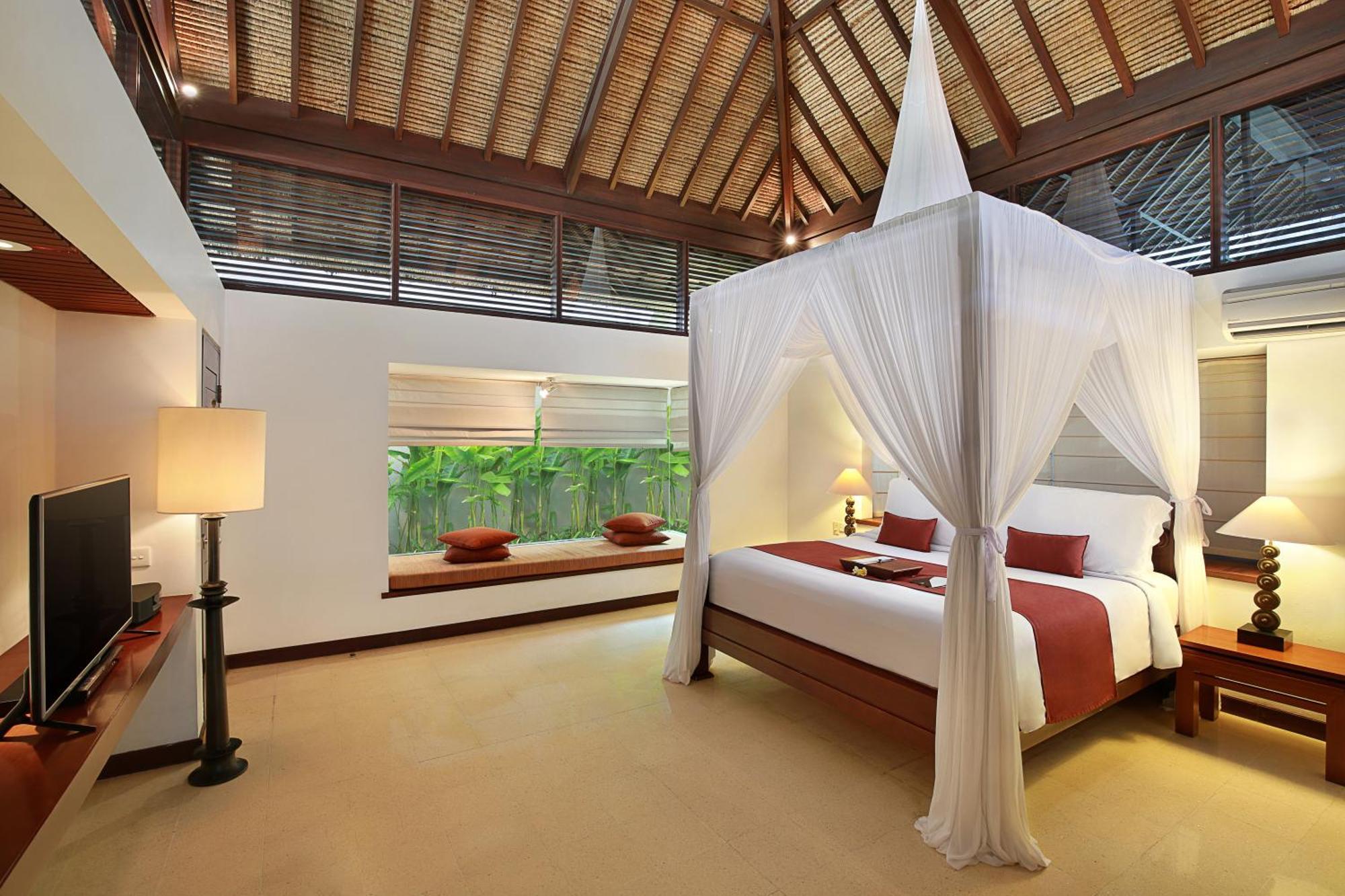Bali Niksoma Boutique Beach Resort Legian Exterior foto A bedroom at the resort