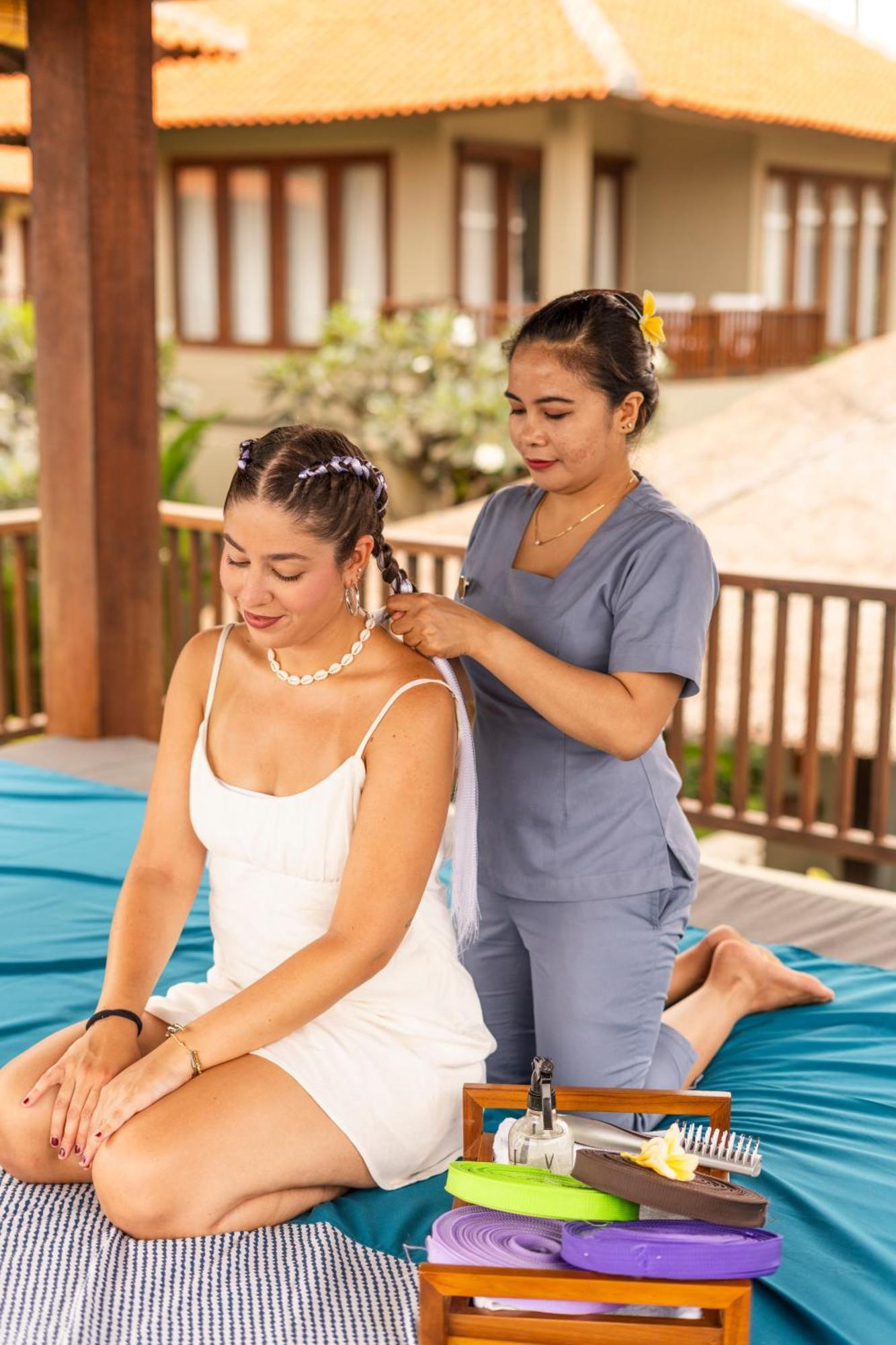 Bali Niksoma Boutique Beach Resort Legian Exterior foto Thai massage
